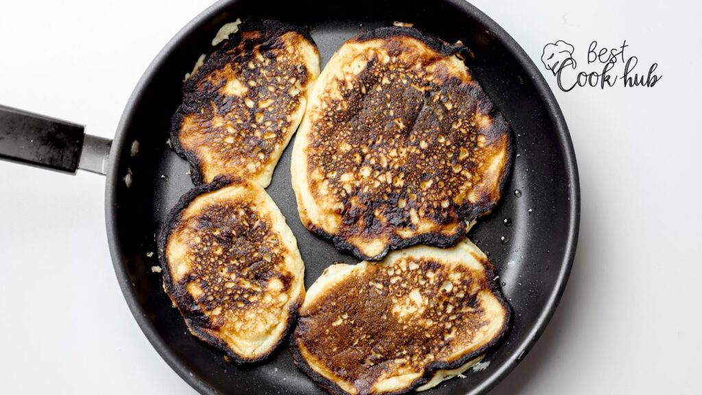 Bestcookhub - Burnt outside and cold inside egg roll showing uneven cooking problem