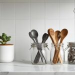 Bestcookhub - Clean, minimalist kitchen counter with organized measuring spoons and cups in jars
