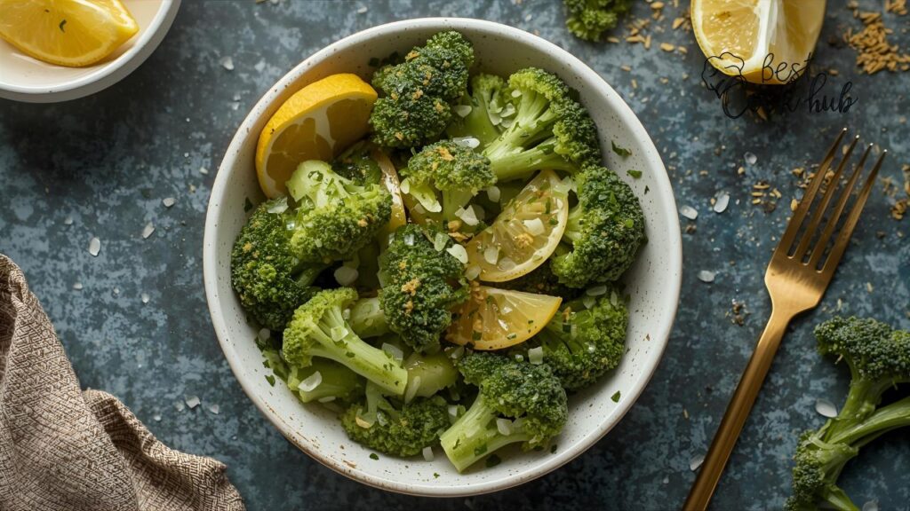 Bestcookhub - Perfectly steamed broccoli served with lemon slices